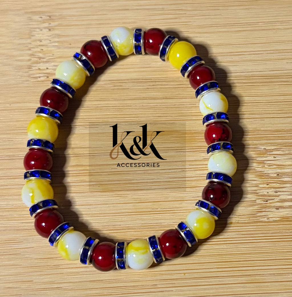 Red, Yellow & Cream Beaded Bracelet with Blue Rhinestone Spacers