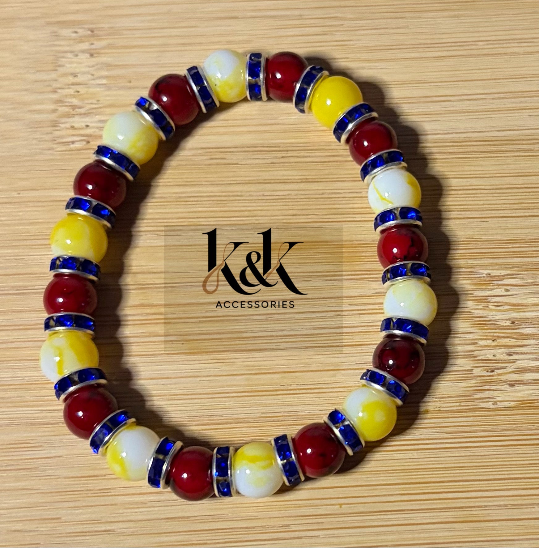 Red, Yellow & Cream Beaded Bracelet with Blue Rhinestone Spacers