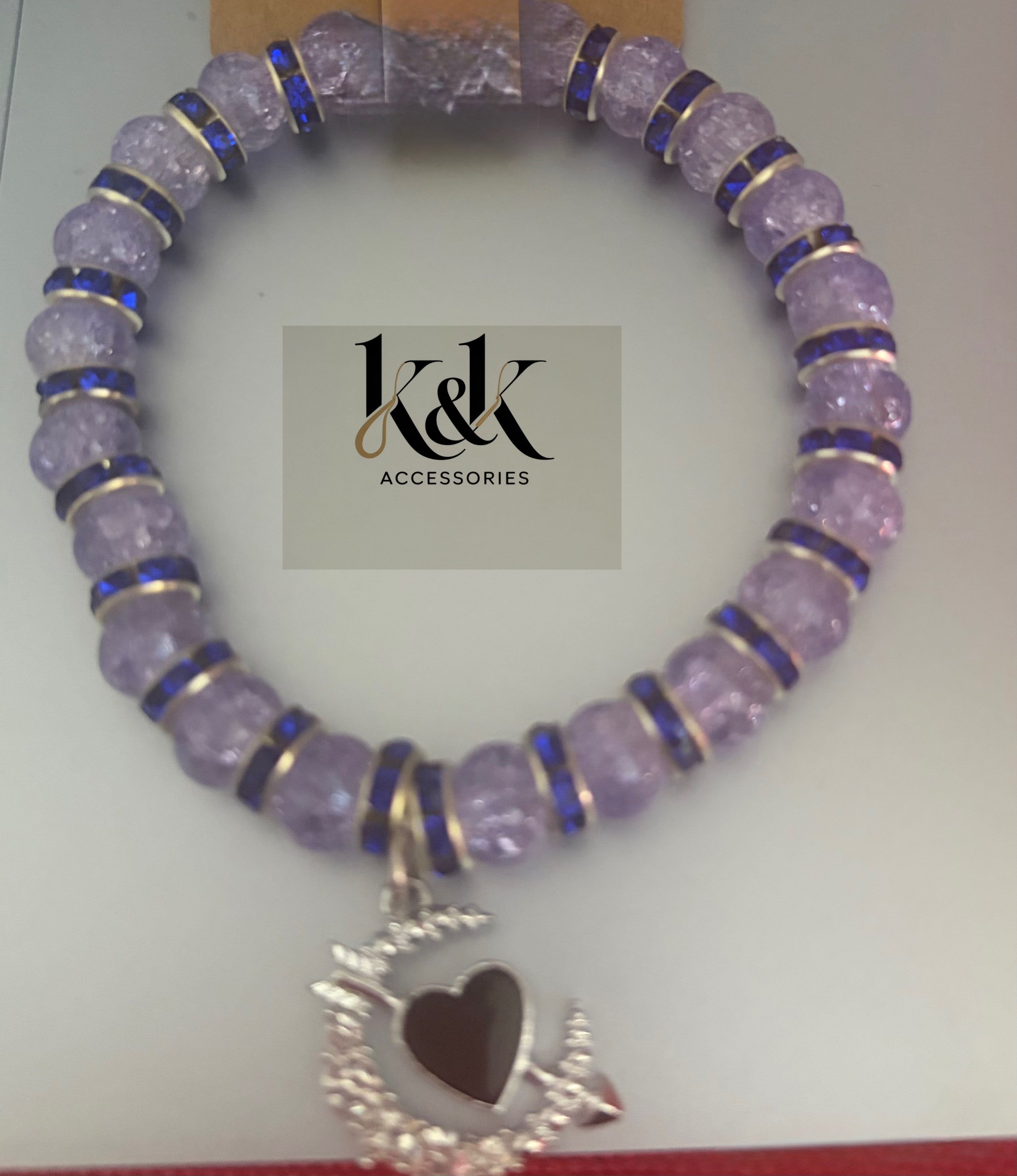 Amethyst effect bracelet with blue rhinestone spacers and moon charm