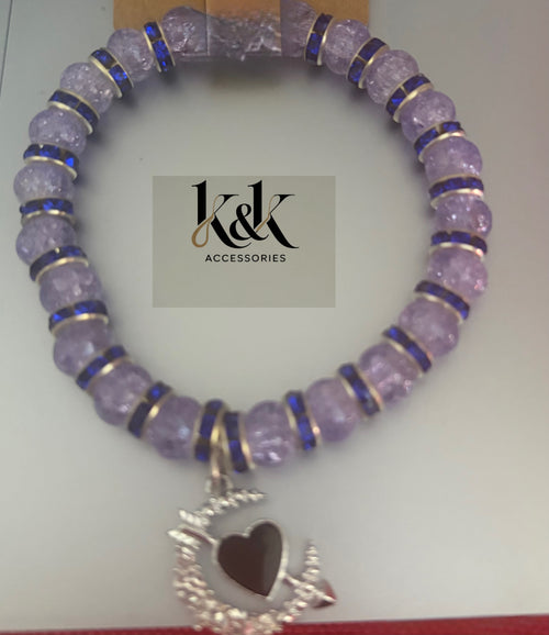 Amethyst effect bracelet with blue rhinestone spacers and moon charm