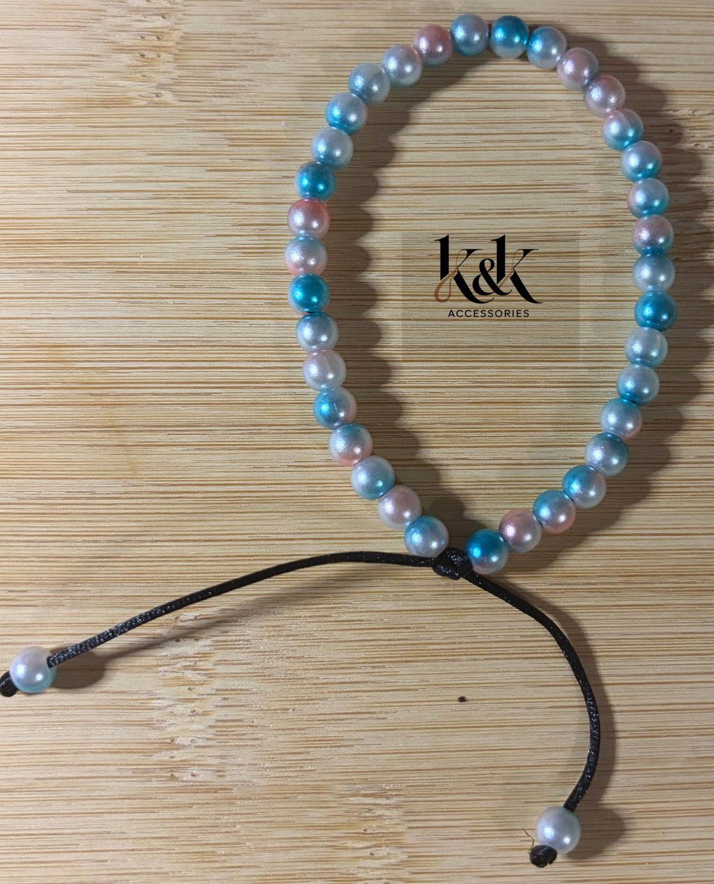 Blue & White Iridescent Pearl Bracelet with Peach Tints - Adjustable