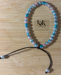 Blue & White Iridescent Pearl Bracelet with Peach Tints - Adjustable