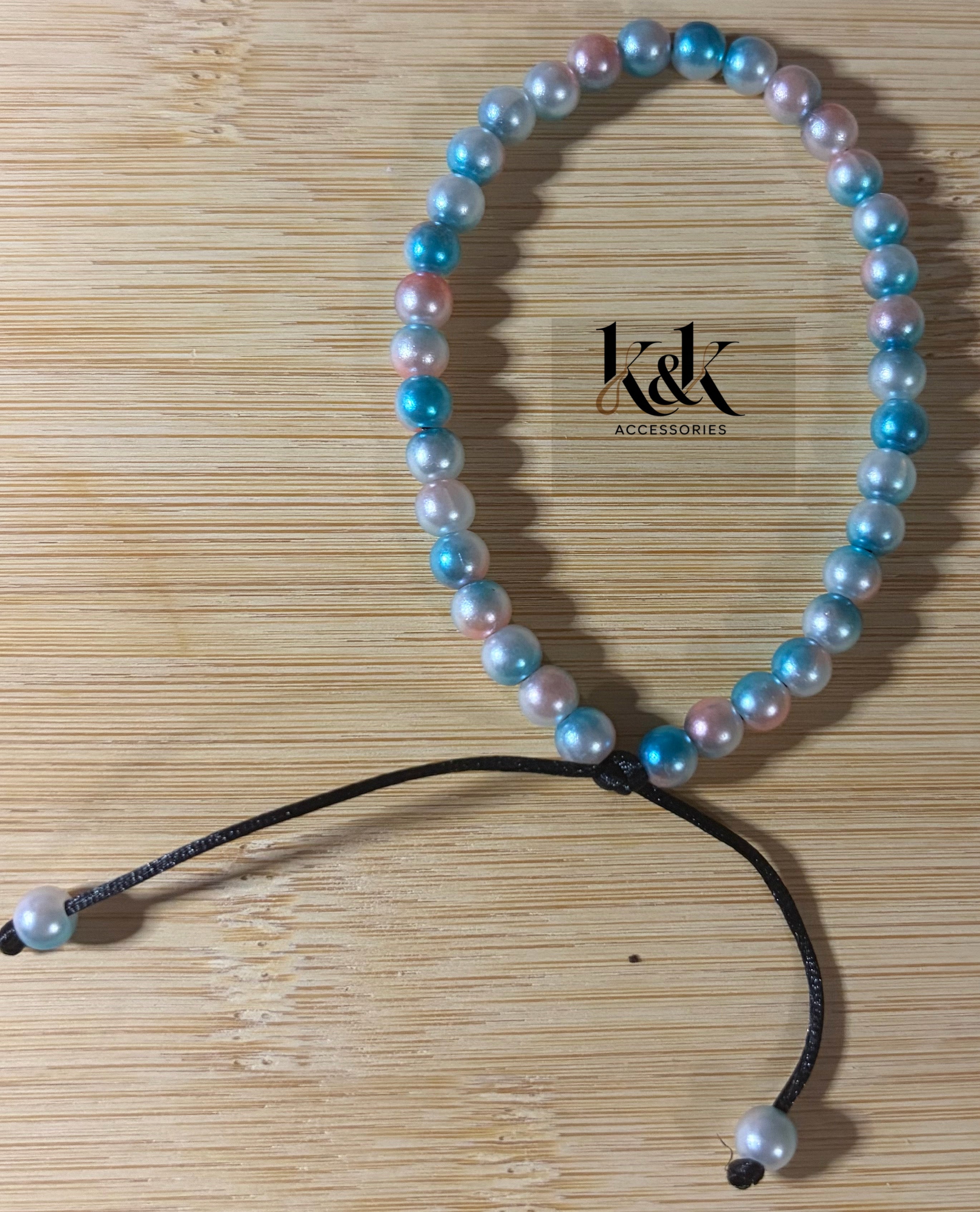 Blue & White Iridescent Pearl Bracelet with Peach Tints - Adjustable