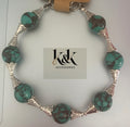 Turquoise and black artisan bracelet