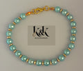 Handmade Turquoise Pearl Bracelet with Gold Accents