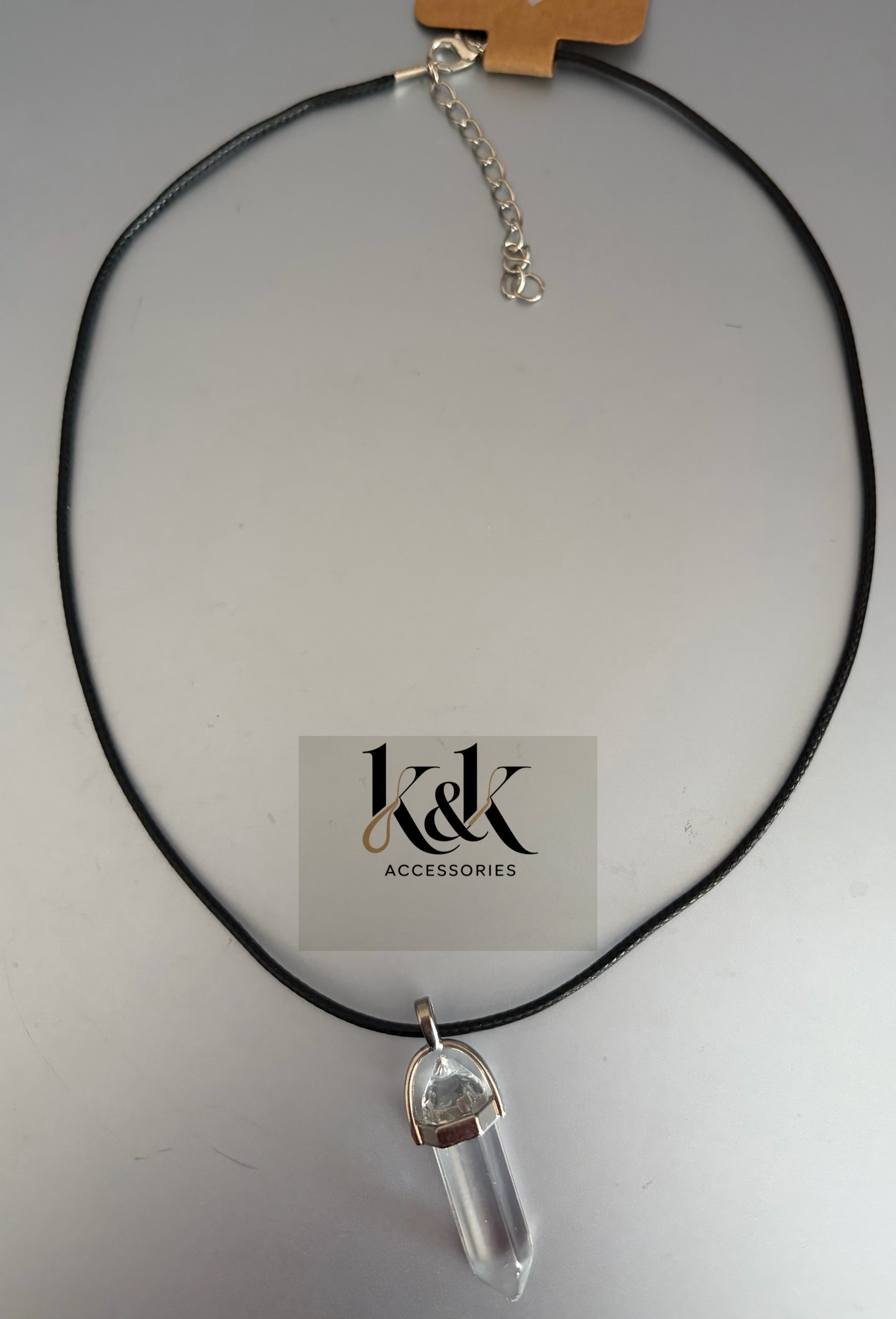 Clear quartz crystal point pendant necklace on black cord