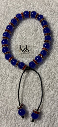 Royal Blue Adjustable Bracelet with Red Rhinestone Spacers - Handmade Beaded Jewellery