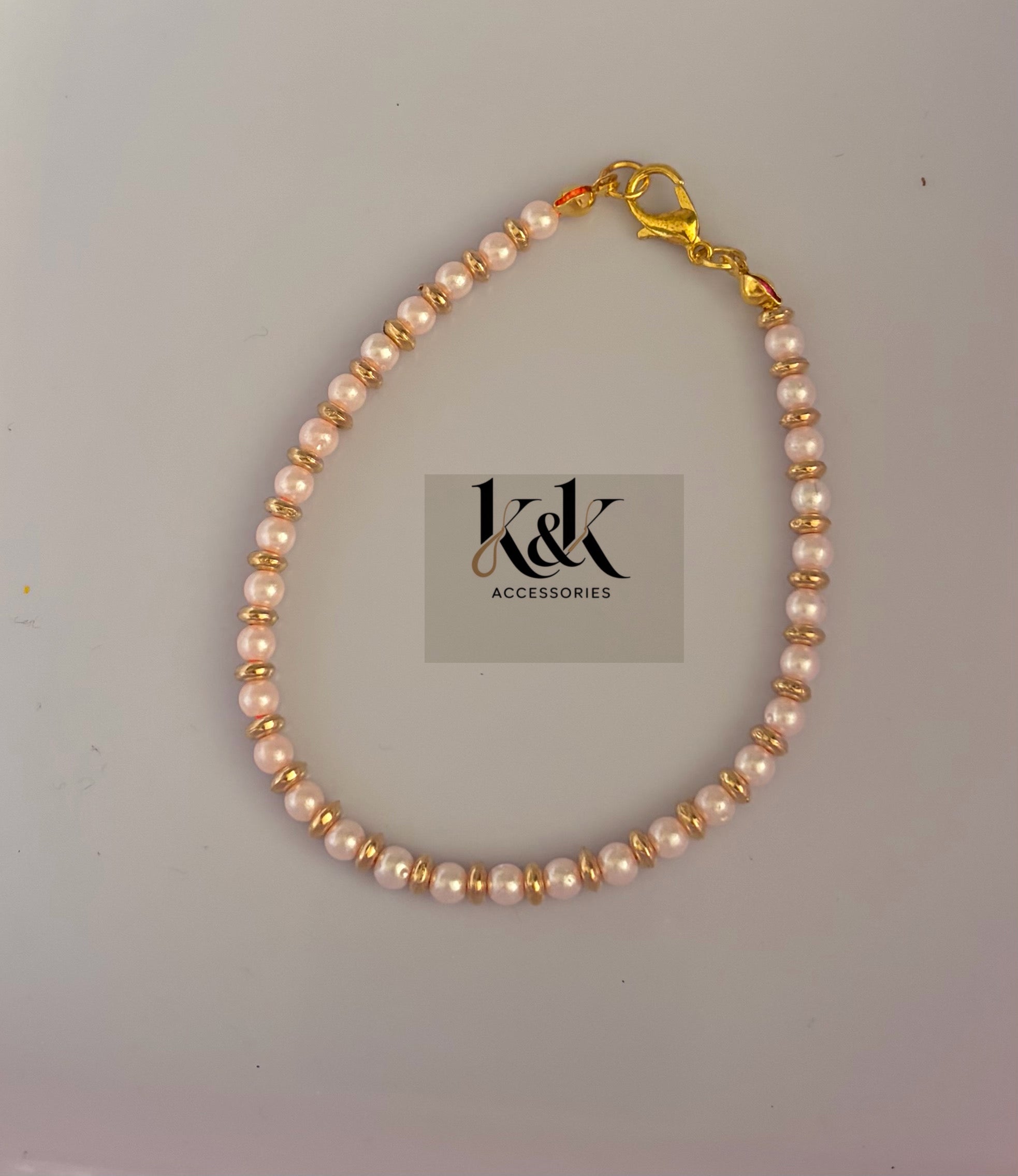 Handmade Pink Pearl Bracelet with Gold Accents