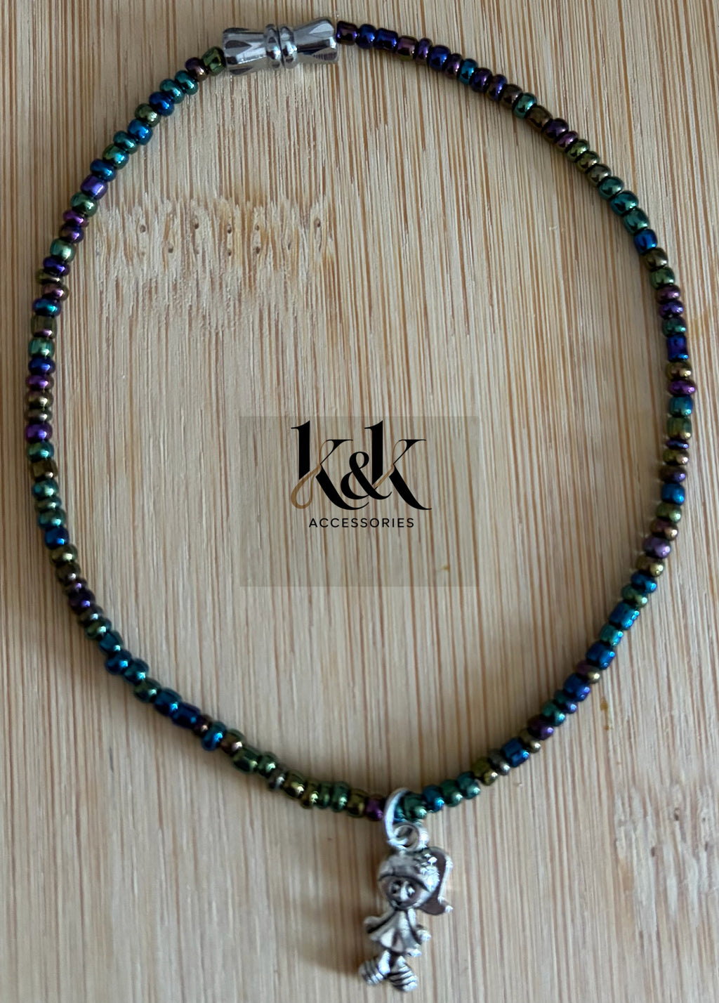 Iridescent Bead Bracelet with Girl Charm